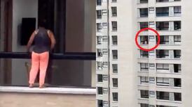 Mulher é flagrada limpando janela do lado de fora de 12º andar sem proteção; vídeo