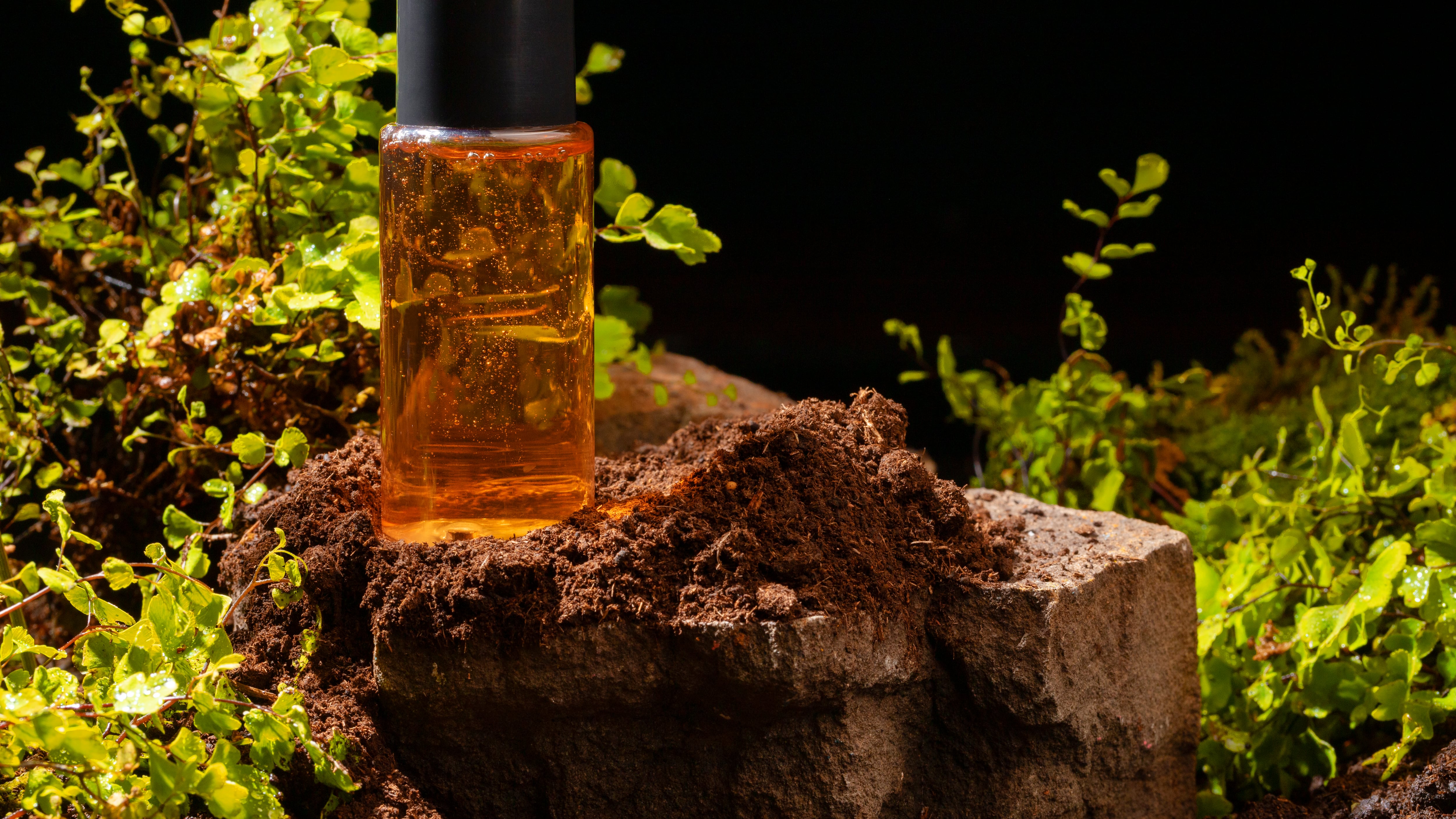 Frasco de perfume laranja