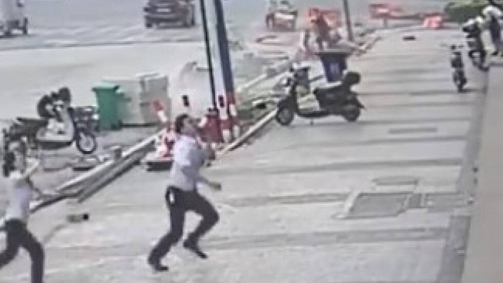 Homem resgata bebê que caiu de prédio na China