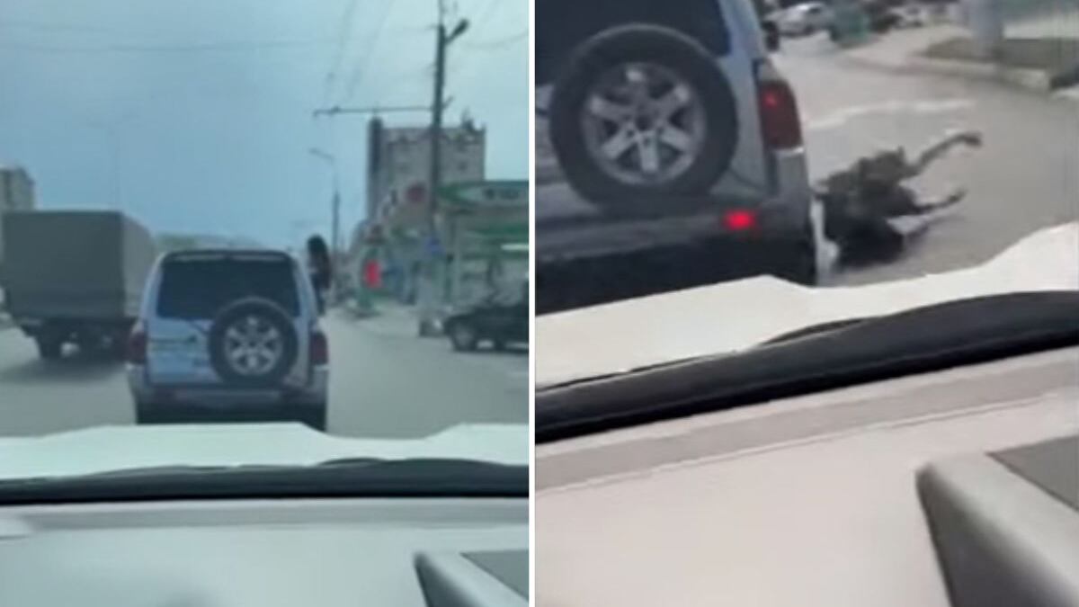 Mulher cai de carro em movimento e bate cabeço no asfalto