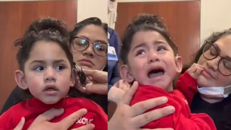 Com ajuda de um aparelho auditivo, criança surda escuta e chora de felicidade