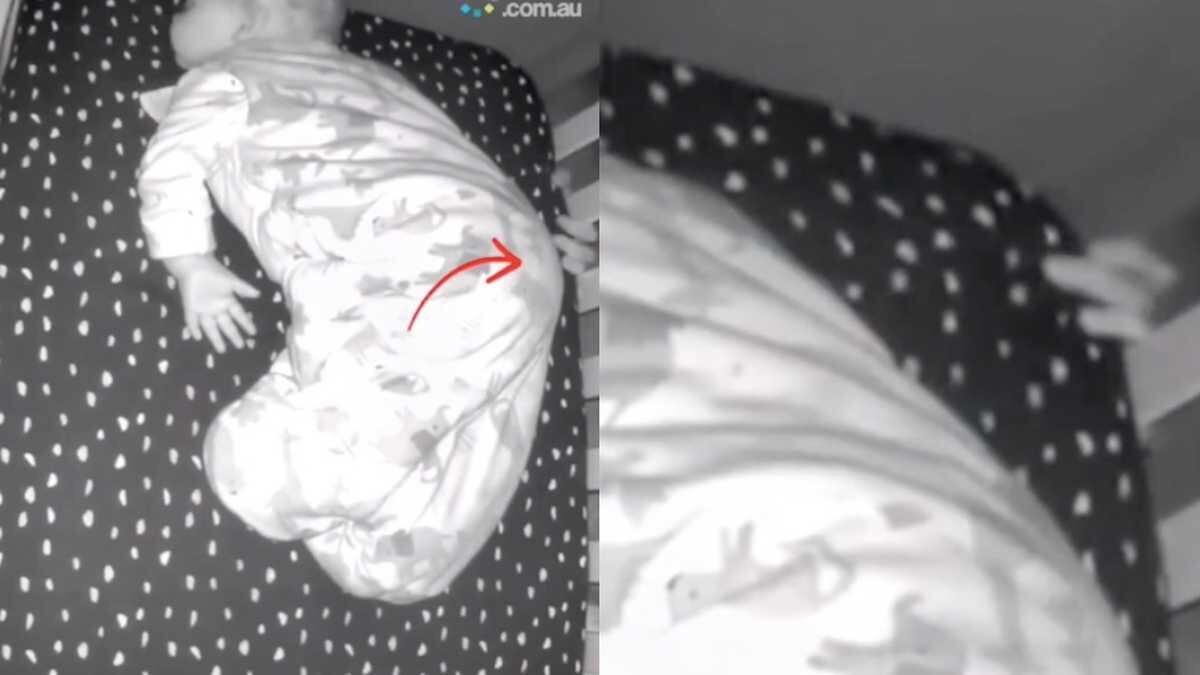 Bebê e suposta mão fantasma.